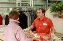 DELUXE DRY CLEANERS logo
