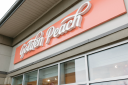Golden Peach Wax Bar logo